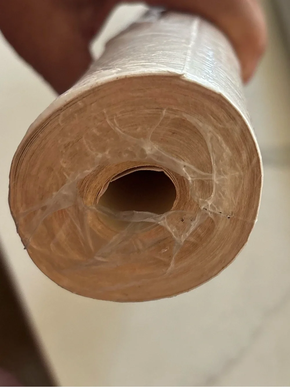 One Roll Wallcoverings wallpaper beige cream abstract design